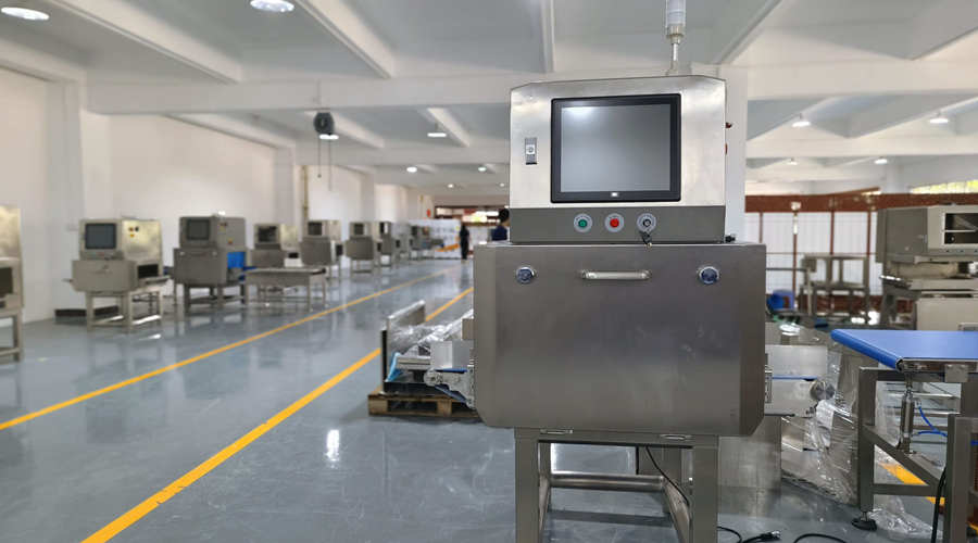 Industrial food X-ray inspection machine with conveyor belt and operator interface panel