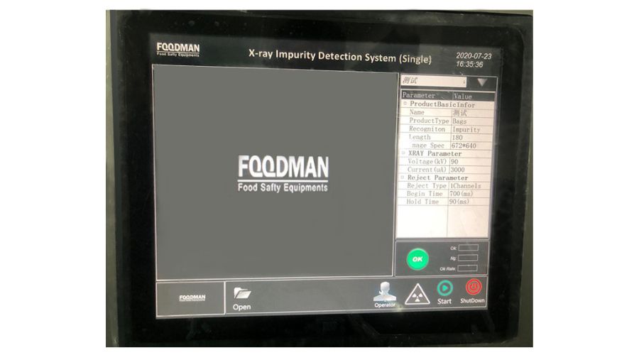 X-ray display screen showing real-time fish fillet scan with small fish bones clearly highlighted as contaminants