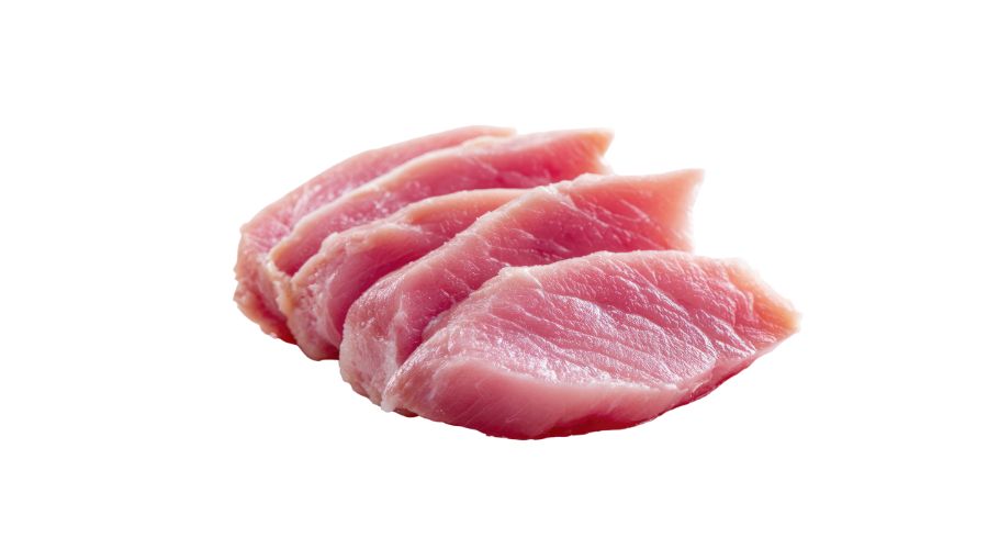 Fresh raw chicken cuts and whole birds on conveyor belt for metal contamination inspection