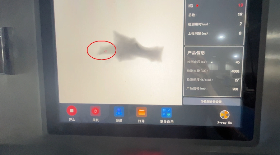 X-ray shadowgraph of chicken feet clearly showing metal wire contaminant highlighted against bone and tissue