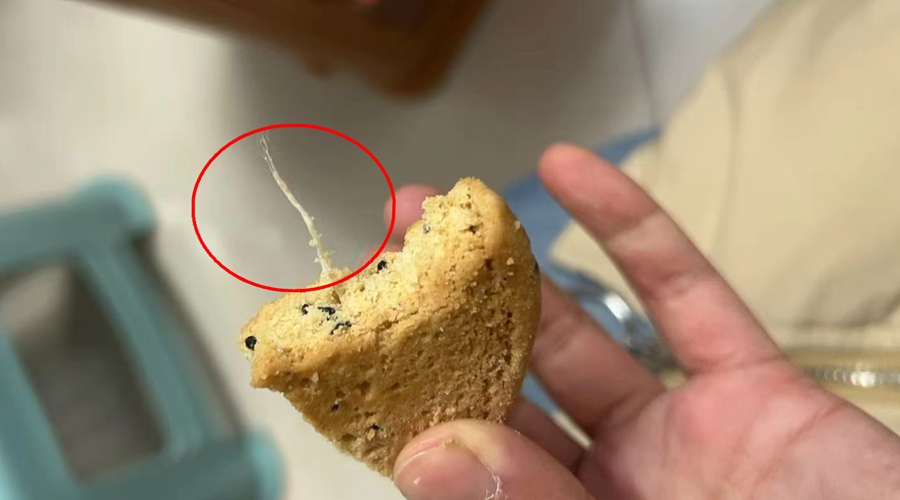 Second X-ray image of walnut cookie showing different angle and position of foreign object contaminant